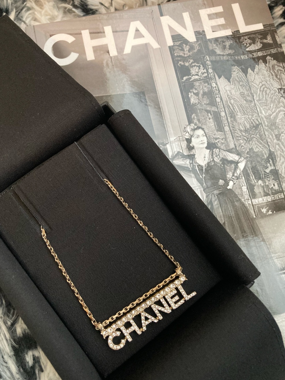 CHANEL Gold and Clear Crystal Logo Necklace